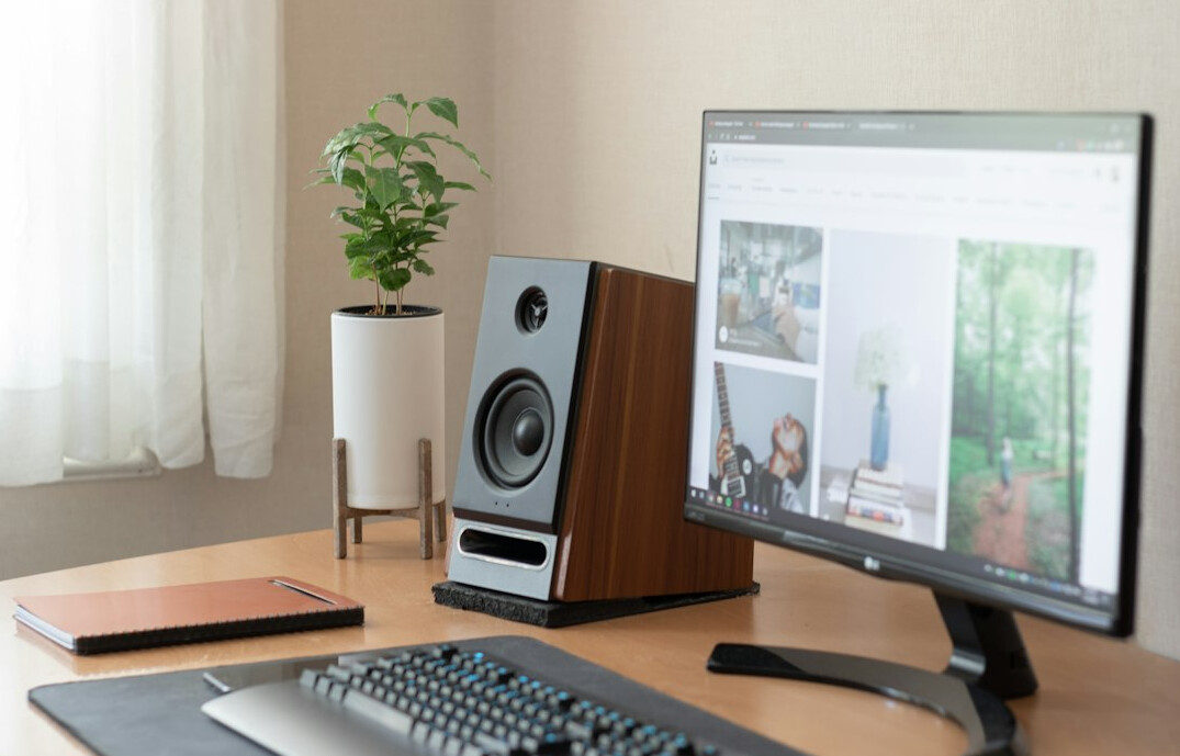 Video editing desk with monitors showing timeline software