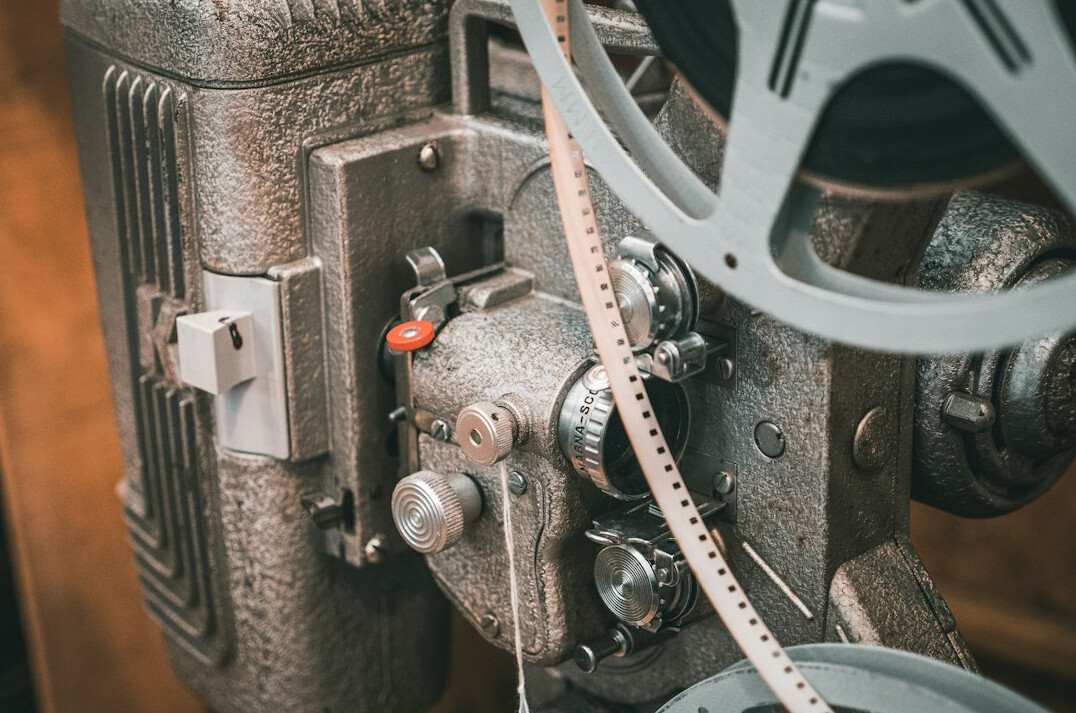 Close-up of a vintage film camera and reel equipment