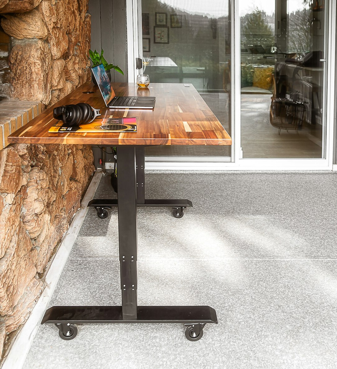 Bright office desk with a laptop and notebook